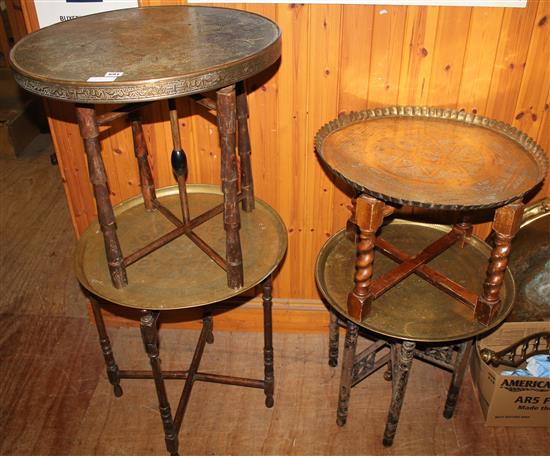 4 circular brass tray tables